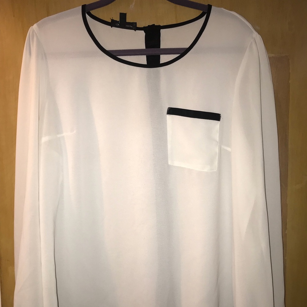 White blouse with black trim